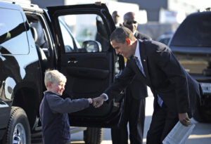 obama-fist-bump-with-child_168045951-300x205-1