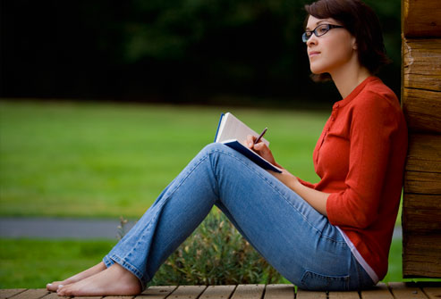woman-writing-in-a-journal
