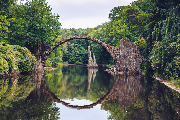 Rakotz bridge (Rakotzbrucke) also known as Devil's Bridge in Kromlau, Germany. Reflection of the bridge in the water create a full circle.