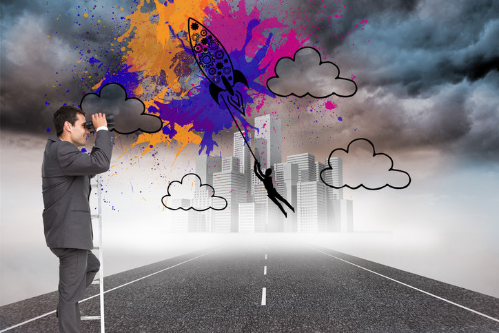 Composite image of businessman standing on ladder