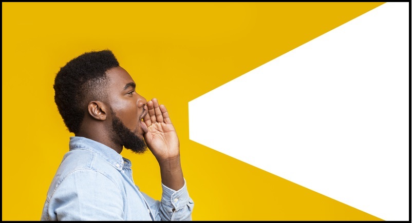 Guy making loud announcement at copy space on yellow background